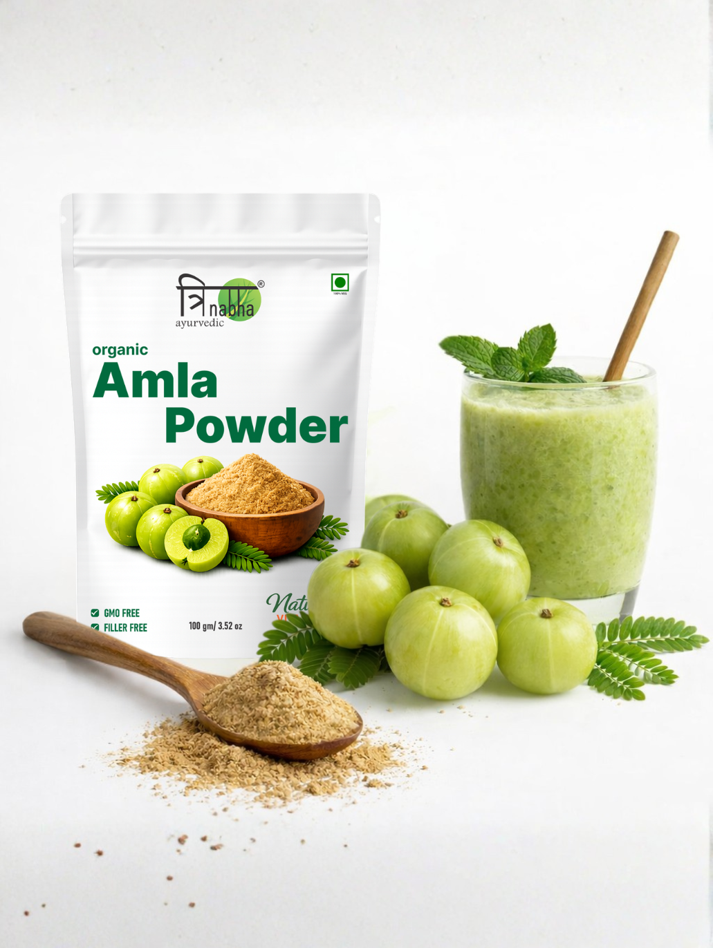 A glass of green amla smoothie with mint leaves, demonstrating a healthy way to consume Trinabha Organic Amla Powder.