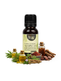 Ayurvedic hair growth oil bottle surrounded by natural herbal extracts and essential oil vials