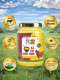 A jar of Trinabha ghee surrounded by golden seals indicating 100% A2 Gir Cow, hand-made, no preservatives, and Made in India.